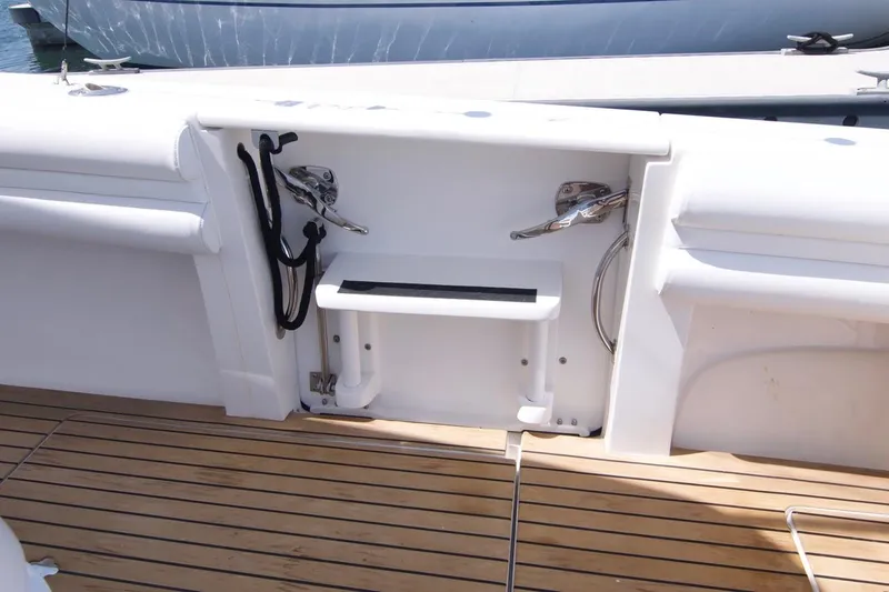  Yacht Photos Pics 2013 Intrepid Center Console boat with teak deck and fishing rod holders.