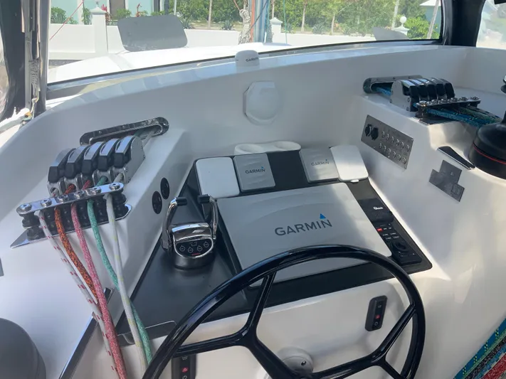 Vanquish Yacht Photos Pics Helm station of 2018 Xquisite Yachts X5 with Garmin navigation system.