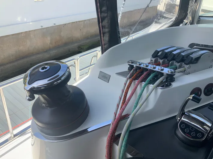 Vanquish Yacht Photos Pics Control panel of 2018 Xquisite Yachts X5 with winch and colorful ropes.