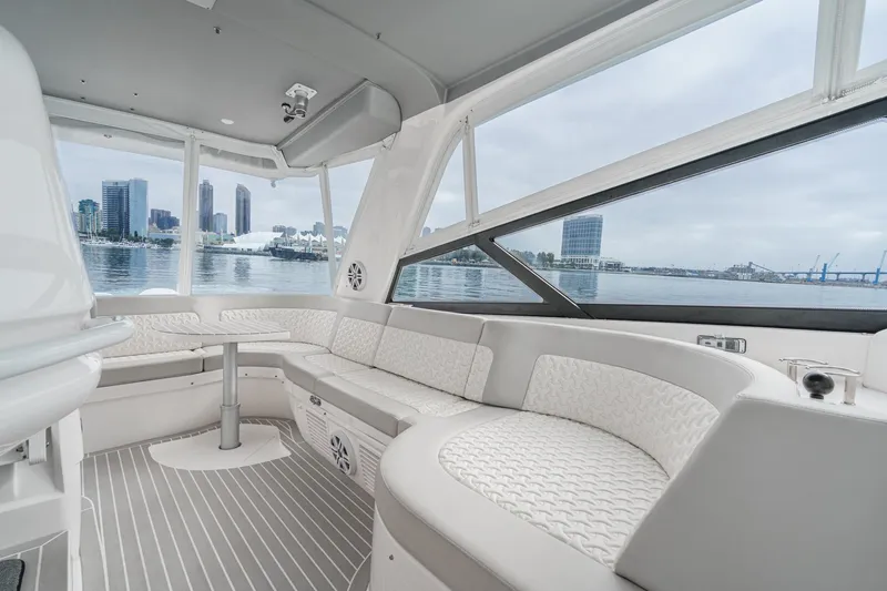 R&r 5 Yacht Photos Pics Interior of 2022 Intrepid 477 Evolution yacht with city skyline view.