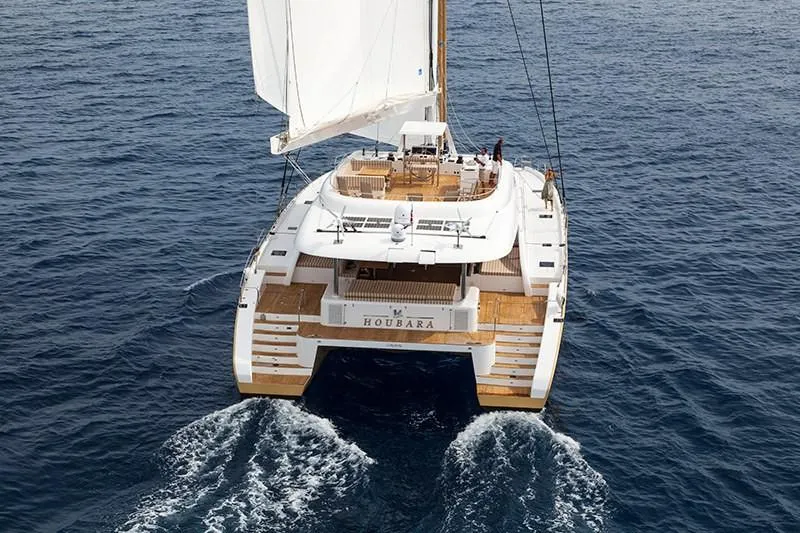 Houbara Yacht Photos Pics Luxury Sunreef 82 DD catamaran sailing on open sea, 2012 model.