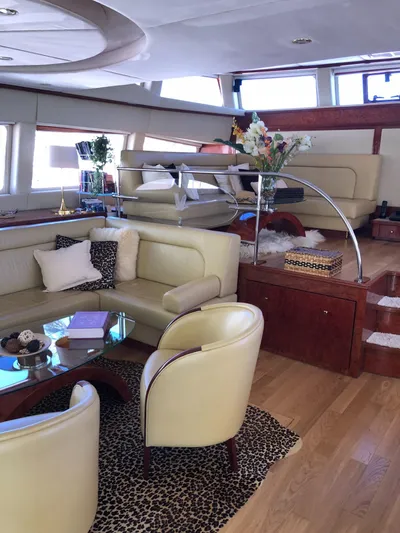 Houbara Yacht Photos Pics Luxurious interior of 2012 Sunreef 82 DD yacht with elegant seating and decor.