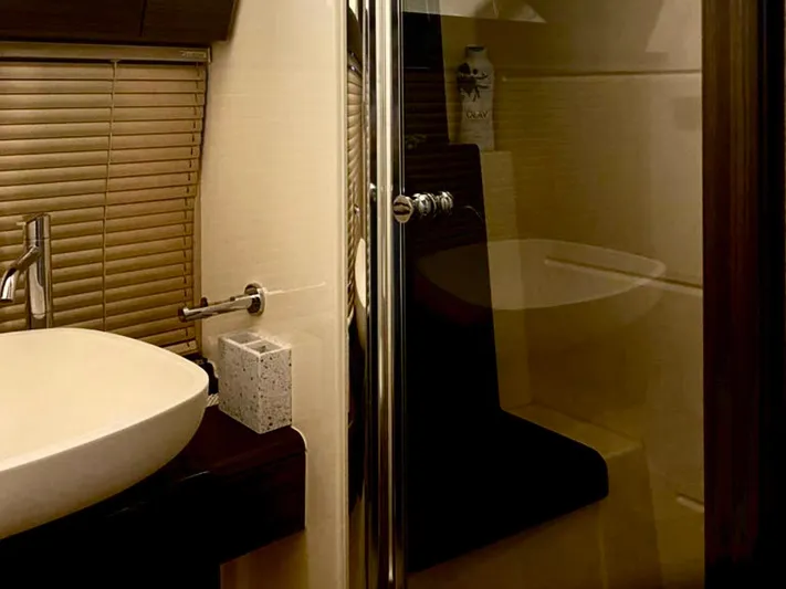Concepcion 1641 Yacht Photos Pics Luxurious bathroom interior of 2013 Azimut 55S yacht with modern fixtures and elegant design.