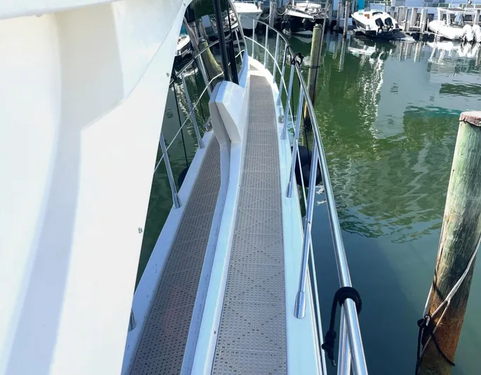 Concepcion 1641 Yacht Photos Pics Azimut 55S 2013 yacht docked, showing side deck and railing.