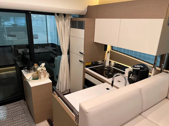  Yacht Photos Pics Luxurious kitchen interior of 2018 Prestige 520S yacht with modern amenities.