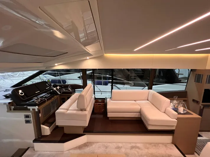  Yacht Photos Pics Luxurious interior of a 2018 Prestige 520S yacht with elegant white seating.