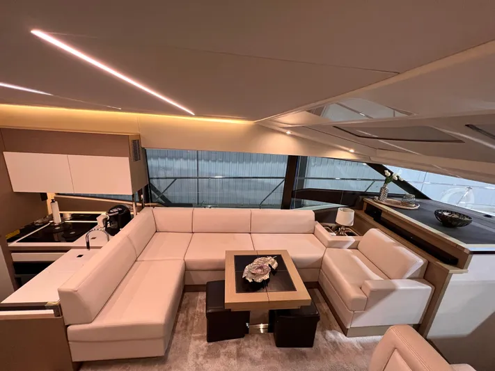  Yacht Photos Pics Luxurious interior of a 2018 Prestige 520S yacht with modern seating and elegant decor.
