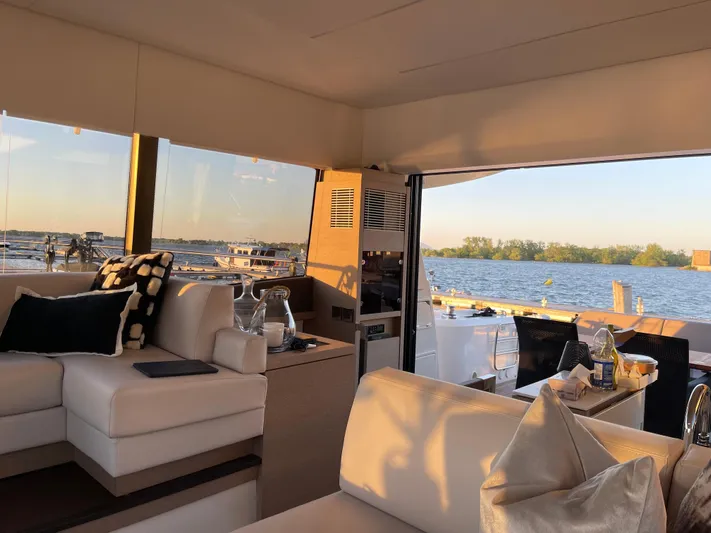  Yacht Photos Pics Luxurious interior of a 2018 Prestige 520S yacht with scenic water views.