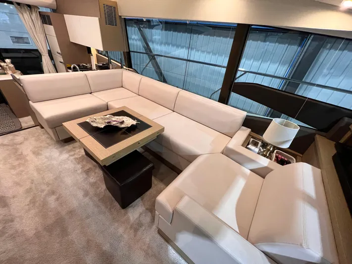  Yacht Photos Pics Luxurious interior of a 2018 Prestige 520S yacht with elegant seating and modern decor.