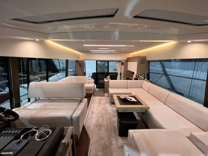  Yacht Photos Pics Luxurious interior of a 2018 Prestige 520S yacht with elegant white seating.