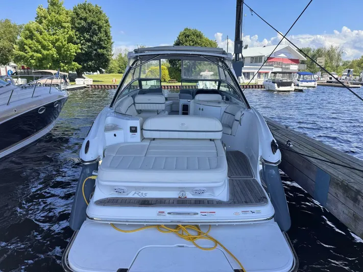  Yacht Photos Pics 2017 Cobalt R35 boat docked at marina, featuring spacious seating and sleek design.