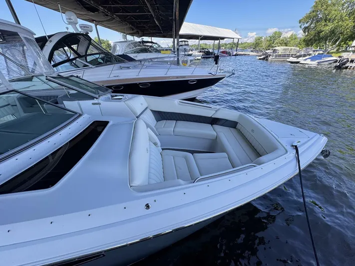  Yacht Photos Pics Luxury 2017 Cobalt R35 boat docked, featuring spacious seating and sleek design.