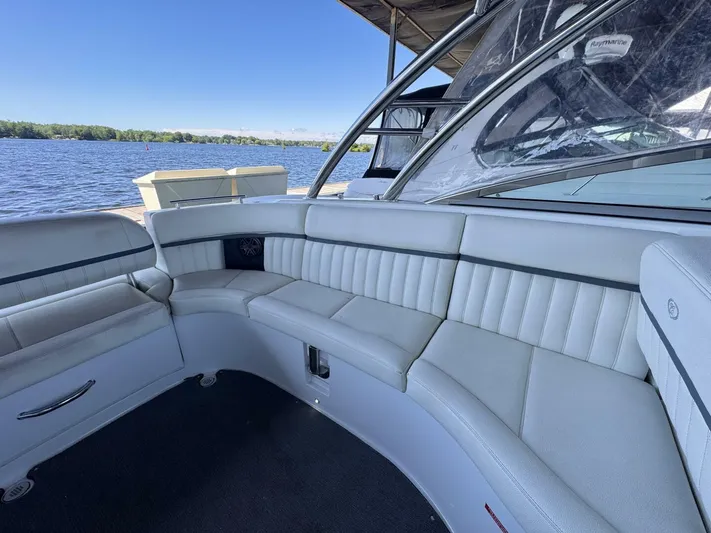  Yacht Photos Pics Luxurious seating on a 2017 Cobalt R35 boat with scenic lake view.