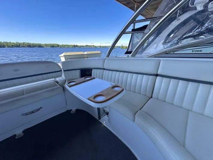 Yacht Photos Pics Luxurious 2017 Cobalt R35 boat interior with white seating and a scenic lake view.