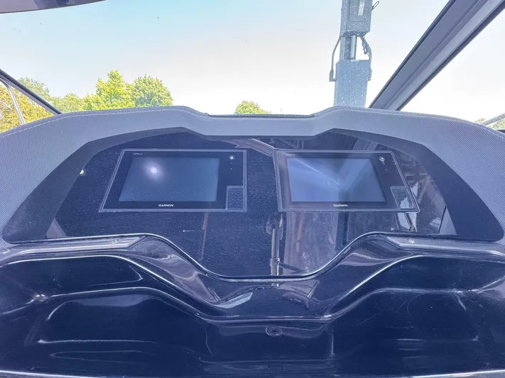  Yacht Photos Pics Dashboard of a 2017 Cobalt R35 boat with dual Garmin displays.