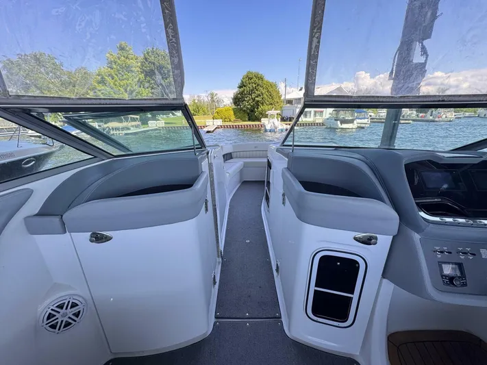  Yacht Photos Pics Interior view of a 2017 Cobalt R35 boat with spacious seating and modern dashboard.