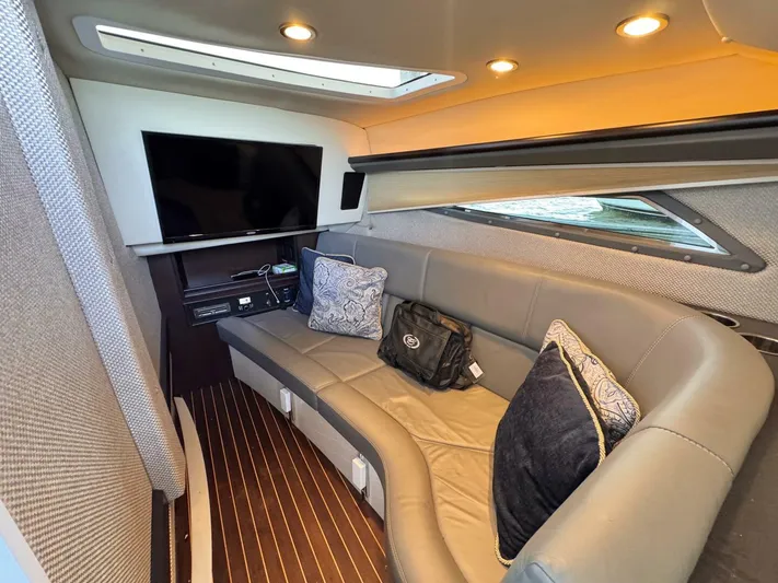  Yacht Photos Pics Luxurious interior of 2017 Cobalt R35 boat with leather seating and entertainment system.