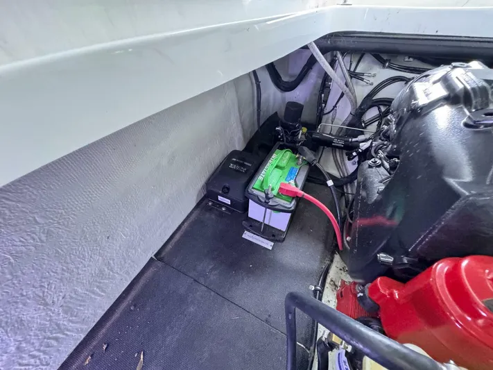  Yacht Photos Pics Engine compartment of a 2017 Cobalt R35, featuring battery and wiring components.