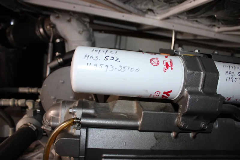 Worth The Wake Yacht Photos Pics Engine component of a 2006 Silverton 42 Convertible, featuring a labeled filter.