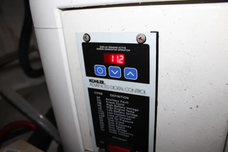 Worth The Wake Yacht Photos Pics Kohler advanced digital control panel on 2006 Silverton 42 Convertible boat.