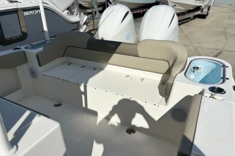  Yacht Photos Pics 2023 Key West 263 FS boat interior with seating and storage compartments.