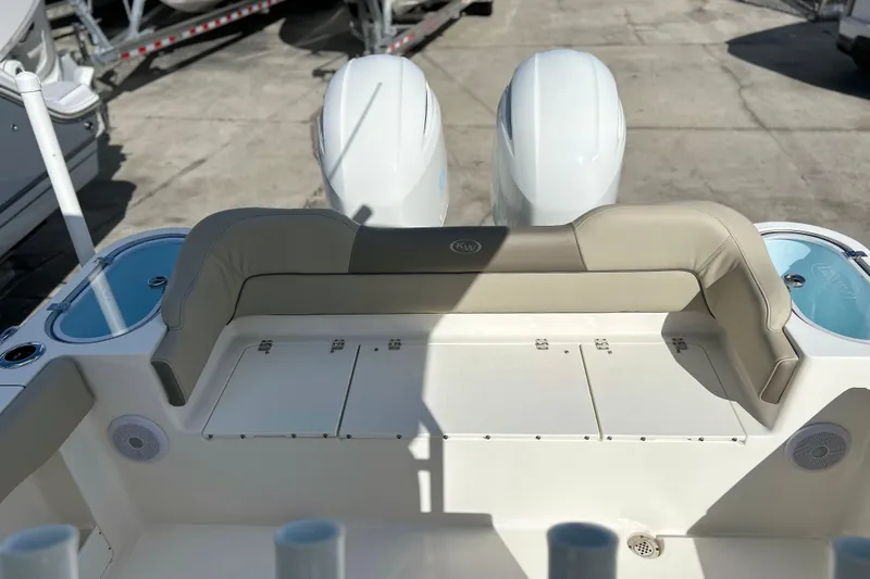  Yacht Photos Pics 2023 Key West 263 FS boat interior with dual engines and seating area.