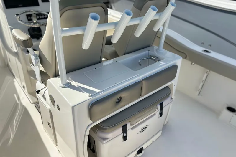  Yacht Photos Pics 2023 Key West 263 FS boat interior with rod holders and seating.