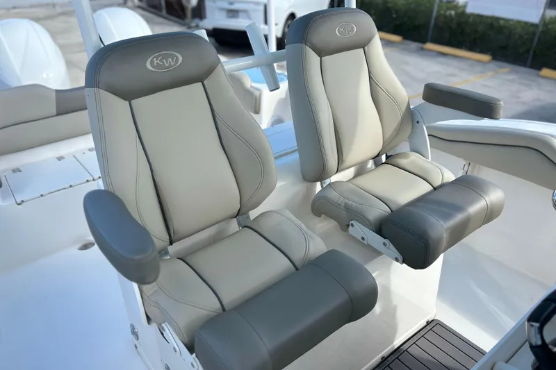  Yacht Photos Pics 2023 Key West 263 FS boat seats, featuring gray and beige cushioned design.
