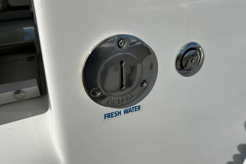  Yacht Photos Pics Fresh water inlet on 2023 Key West 263 FS boat, chrome finish.