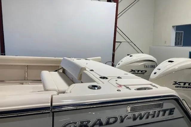  Yacht Photos Pics 2026 Grady-White Canyon 336 boat with Yamaha XTO Offshore engines in a showroom.