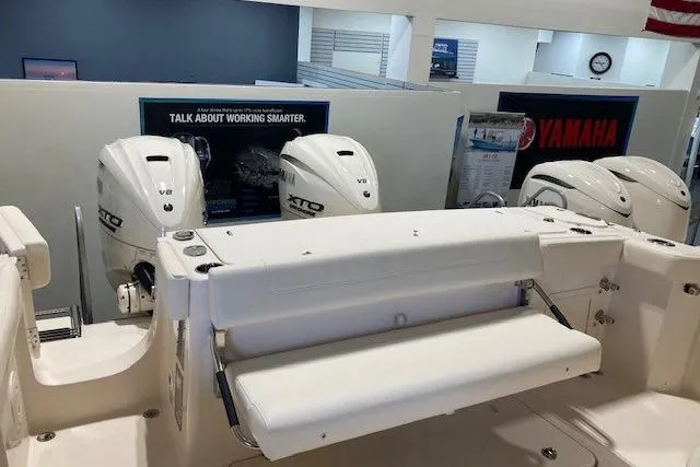  Yacht Photos Pics 2026 Grady-White Canyon 336 boat with Yamaha V8 engines in showroom.