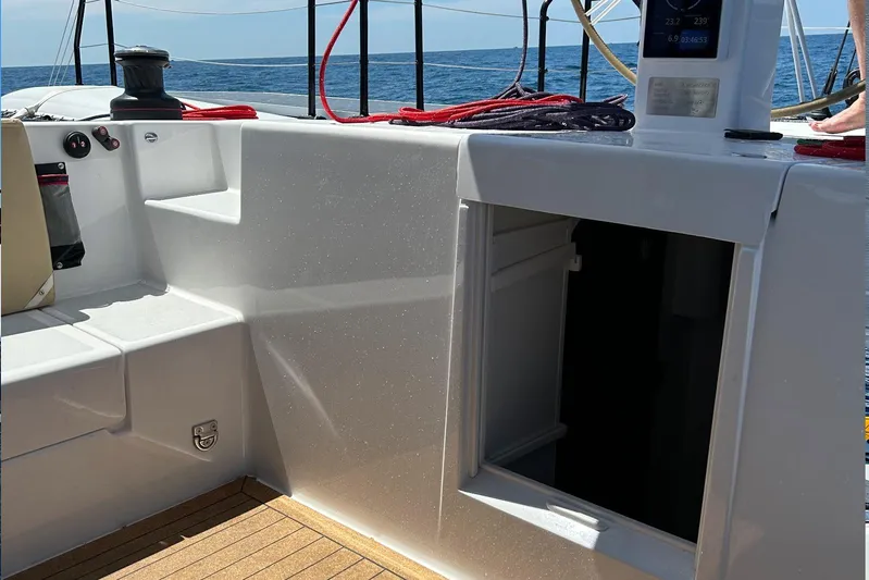  Yacht Photos Pics Rapido 60 yacht cockpit with open hatch, ropes, and ocean view, 2026 model.