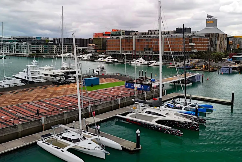 Yacht Photos Pics Marina with Rapido 60 trimaran, 2026 model, docked alongside other yachts.