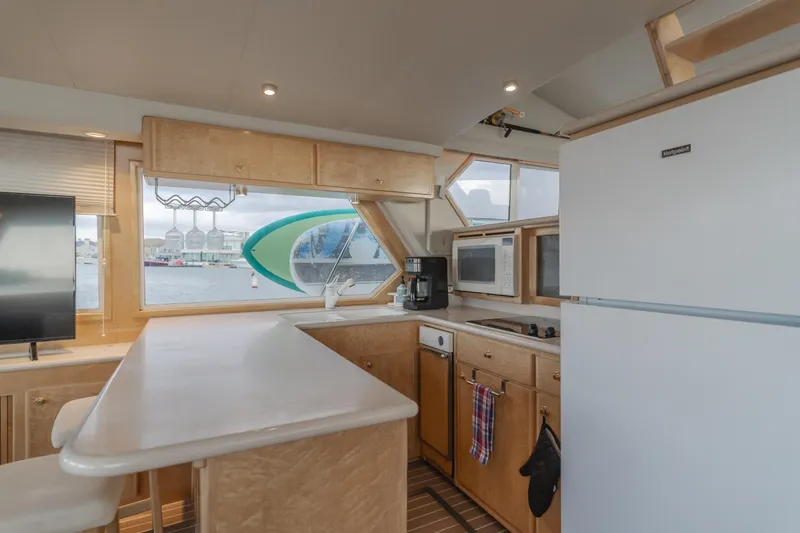 Silvius Brabo Yacht Photos Pics Spacious kitchen interior of 2000 Navigator 53 Classic yacht with modern amenities and large windows.