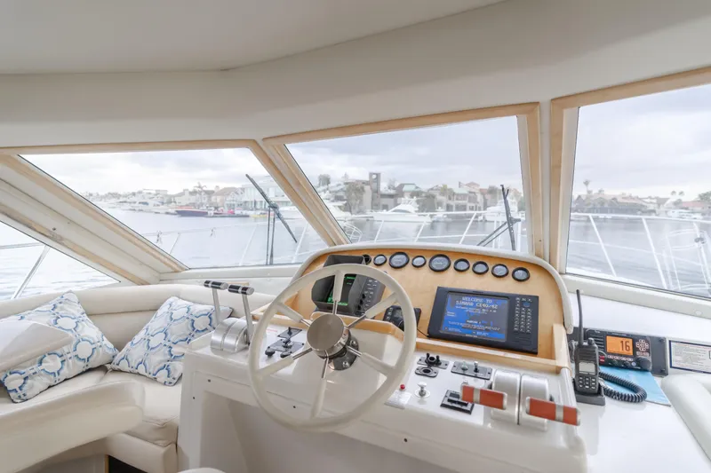 Silvius Brabo Yacht Photos Pics Interior view of 2000 Navigator 53 Classic yacht helm with modern controls and panoramic windows.