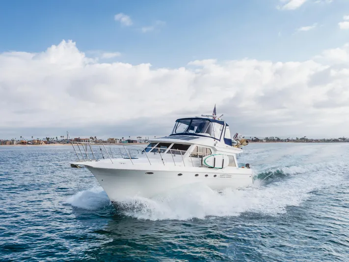 Silvius Brabo Yacht Photos Pics Navigator 53 Classic yacht cruising on open water under a partly cloudy sky.