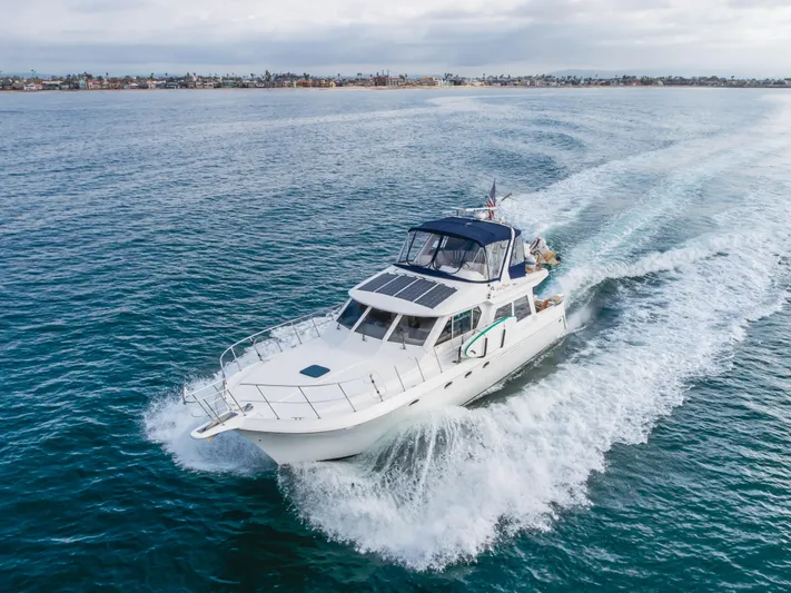 Silvius Brabo Yacht Photos Pics Navigator 53 Classic yacht cruising on open water, 2000 model, aerial view.