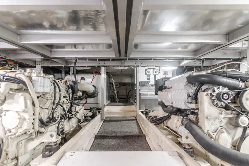 Silvius Brabo Yacht Photos Pics Engine room of 2000 Navigator 53 Classic yacht, showcasing dual engines and mechanical components.
