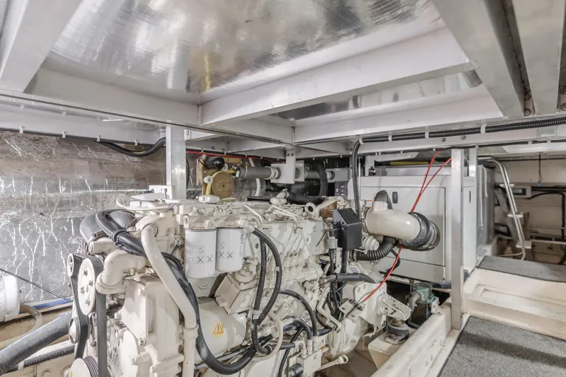 Silvius Brabo Yacht Photos Pics Engine room of 2000 Navigator 53 Classic yacht, showcasing mechanical components and wiring.