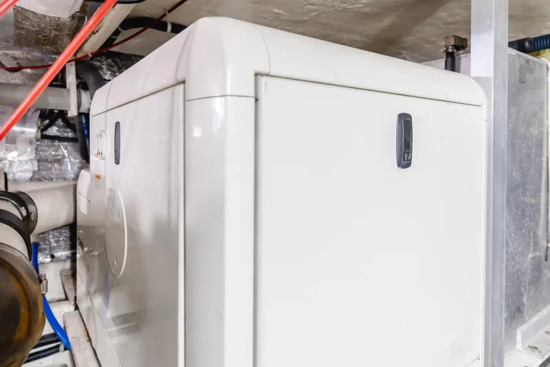 Silvius Brabo Yacht Photos Pics Engine room of 2000 Navigator 53 Classic yacht, featuring machinery and equipment.