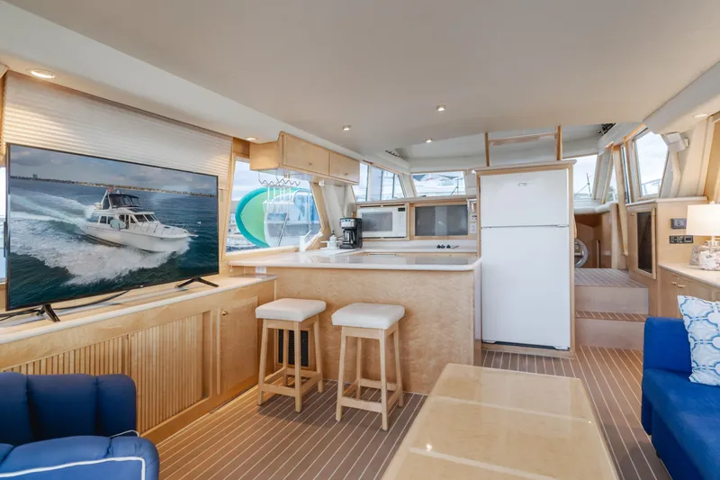 Silvius Brabo Yacht Photos Pics Luxurious interior of 2000 Navigator 53 Classic yacht with modern amenities and stylish decor.