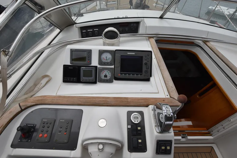 Artemis Yacht Photos Pics Cockpit of 2004 Beneteau 57 yacht with navigation instruments and controls.