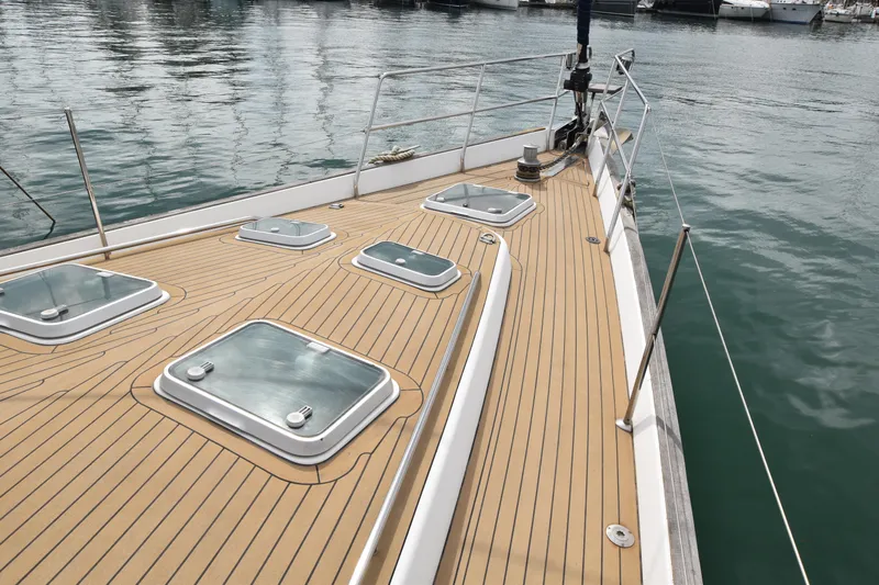 Artemis Yacht Photos Pics Deck of 2004 Beneteau 57 yacht with sleek design and multiple hatches.