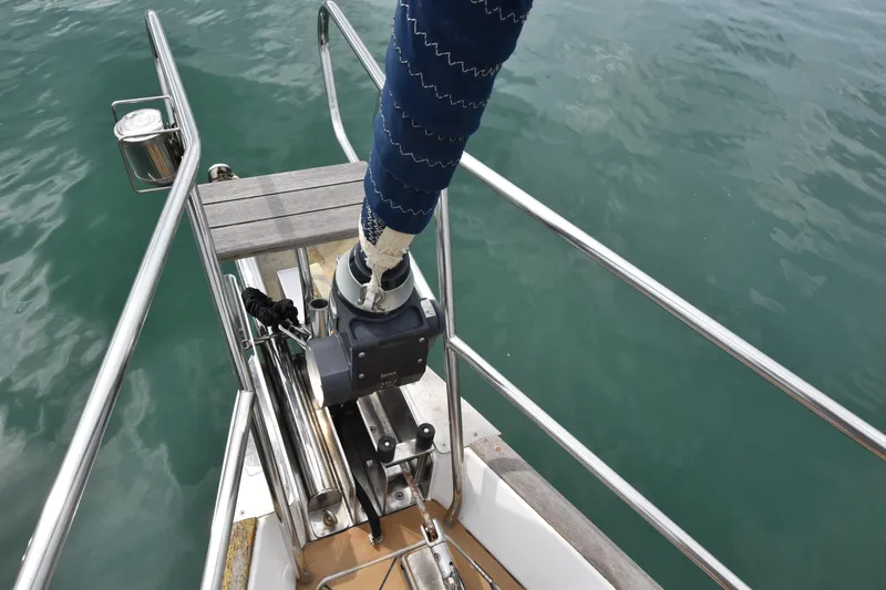 Artemis Yacht Photos Pics Bow of 2004 Beneteau 57 sailboat with stainless steel railings and winch.