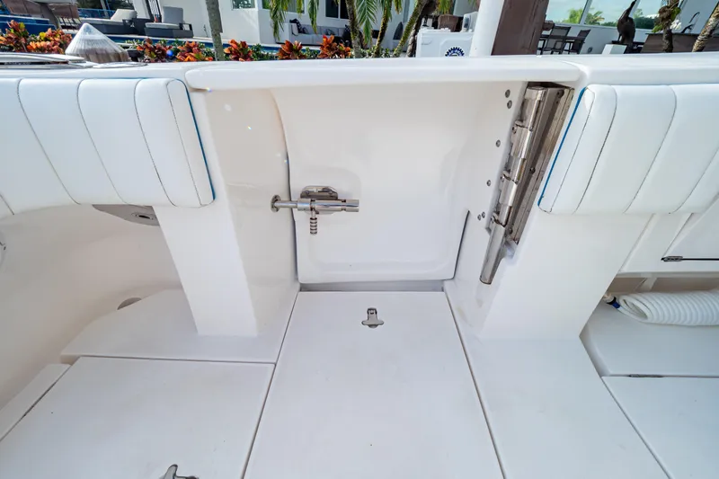 Yacht Photos Pics 2019 Intrepid 407 Cuddy boat interior with white seating and deck details.