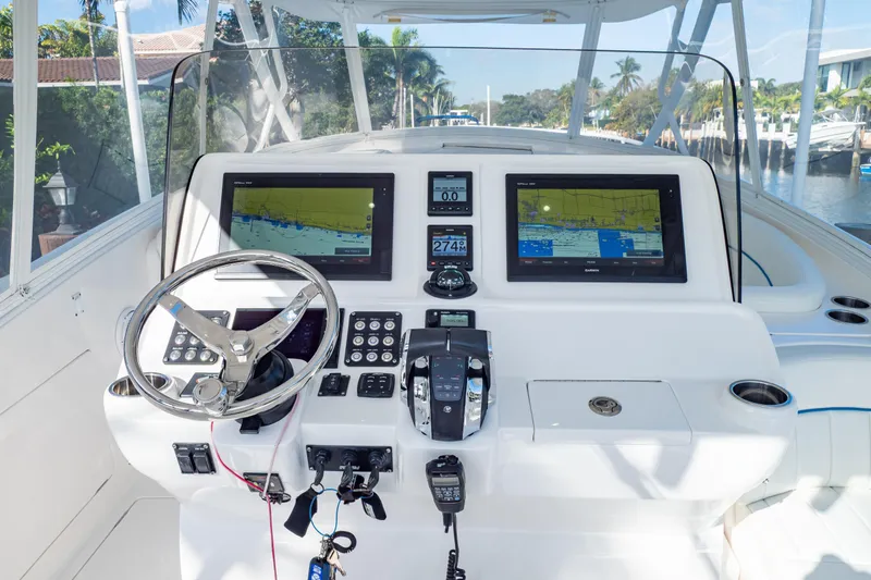  Yacht Photos Pics 2019 Intrepid 407 Cuddy helm with dual navigation screens and modern controls.