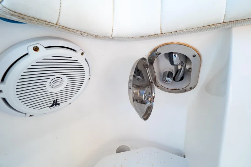  Yacht Photos Pics 2019 Intrepid 407 Cuddy boat interior with JL Audio speaker and metal fixture.