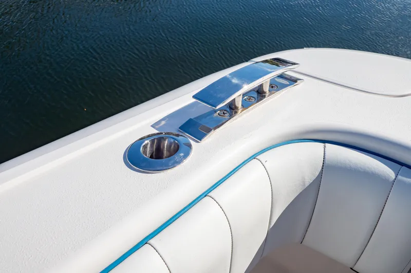  Yacht Photos Pics 2019 Intrepid 407 Cuddy boat detail with chrome fittings and white upholstery.
