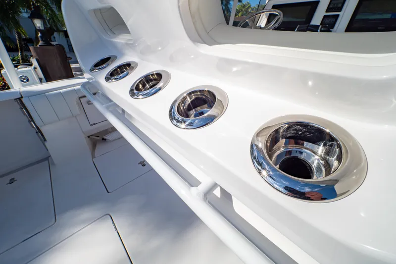  Yacht Photos Pics 2019 Intrepid 407 Cuddy boat interior with stainless steel cup holders.