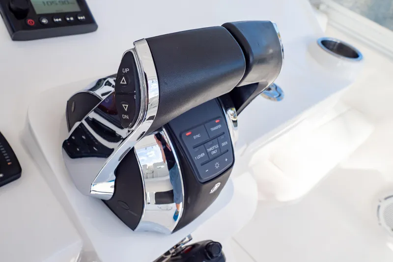  Yacht Photos Pics Throttle controls on a 2019 Intrepid 407 Cuddy boat dashboard.
